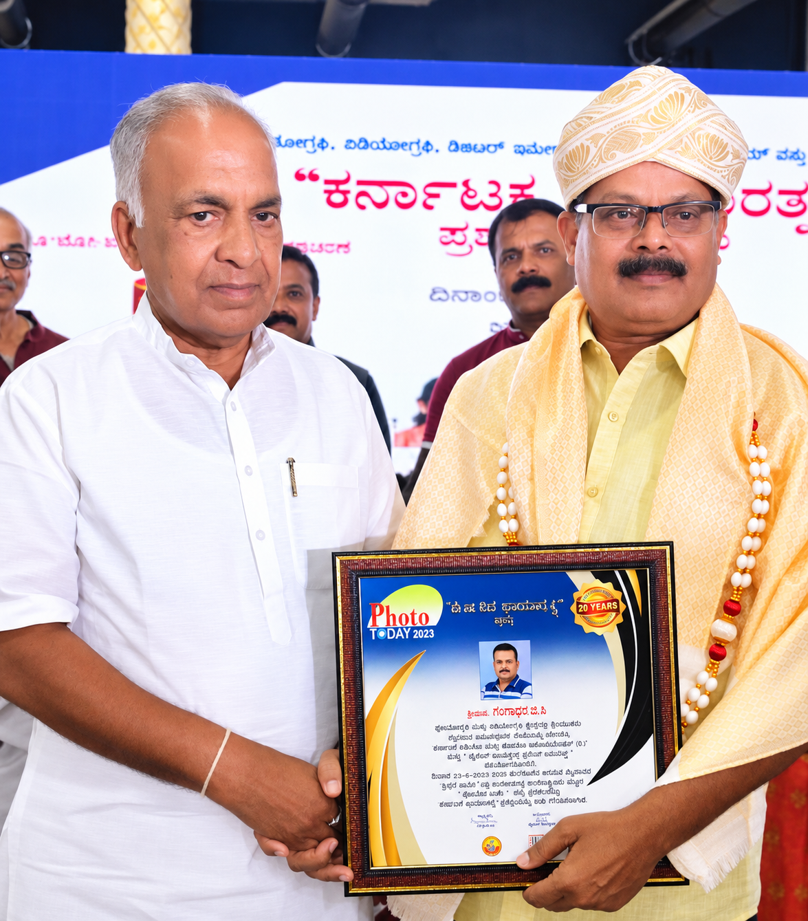 Gangadhara GC receiving an award